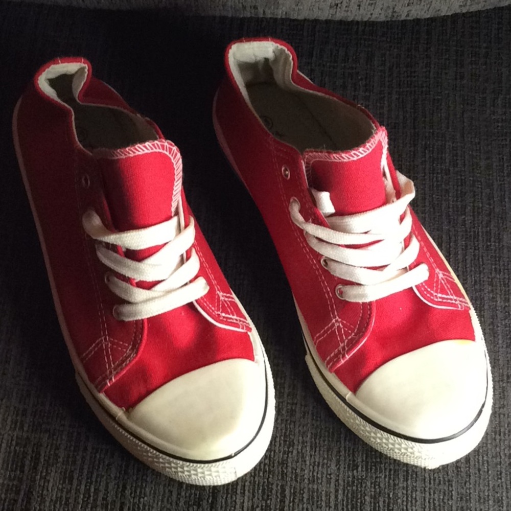 Red and white tennis shoes